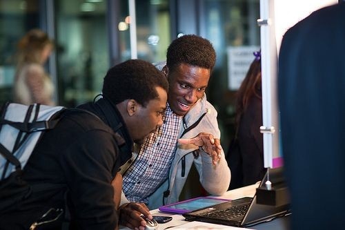  Nigerian citizens engaging with digital participation platform representing national reform and inclusive economic growth