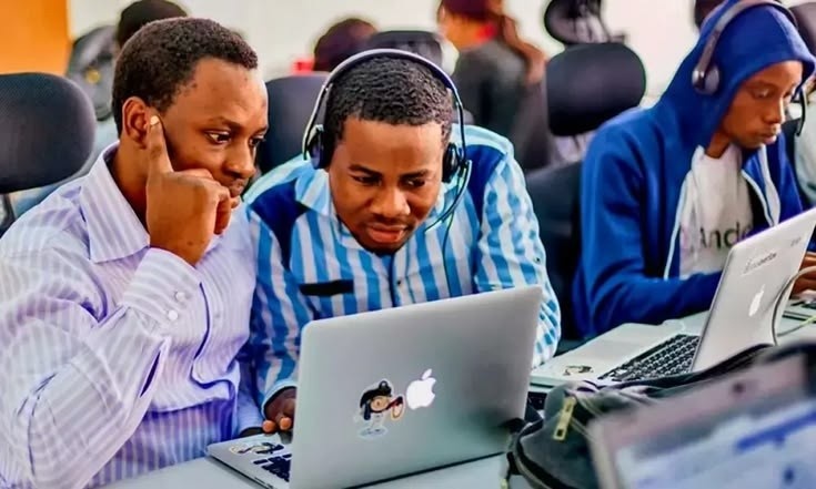 Determined young Nigerian building economic security through digital participation and effort without needing starting capital